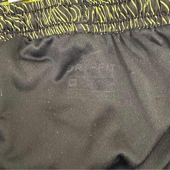 NIKE Women's DRI-FIT Dry Tempo Running Short - Volt Black - Medium - Picture 13 of 15